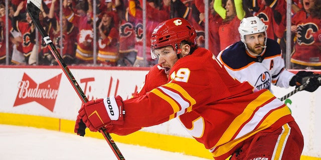 Matthew Tkachuk #19 of the Calgary Flames celebrates after scoring against the Edmonton Oilers during the third period of Game One of the Second Round of the 2022 Stanley Cup Playoffs at Scotiabank Saddledome on May 18, 2022 in Calgary, Alberta, Canada.