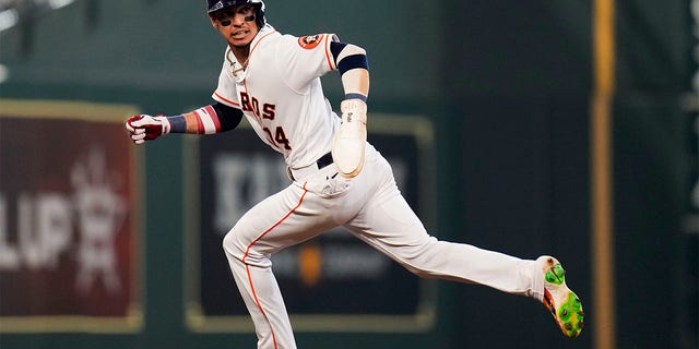 Mauricio Dubon of the Houston Astros is third after Dubon's first unsuccessful pickoff-attempt by starting pitcher Jonathan Hesley by the Kansas City Royals during the fifth inning of a baseball game on Monday, July 4, 2022 in Houston.