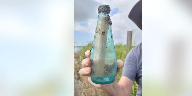 A group cleaning up trash in La Marque, Texas, over the weekend found a message in a bottle from around 1995 - and even tracked down one of the people who signed the note.
