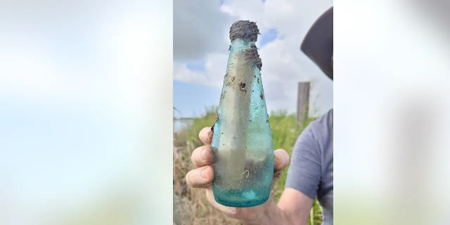 A group cleaning up trash in La Marque, Texas, over the weekend found a message in a bottle from around 1995 - and even tracked down one of the people who signed the note.