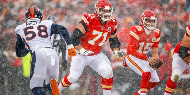 Kansas City Chiefs' Mitchell Schwartz (71) prepares to block the incoming pass rush of Denver Broncos' Von Miller (58) during the second quarter at Arrowhead Stadium on December 15, 2019 in Kansas City, Missouri. 