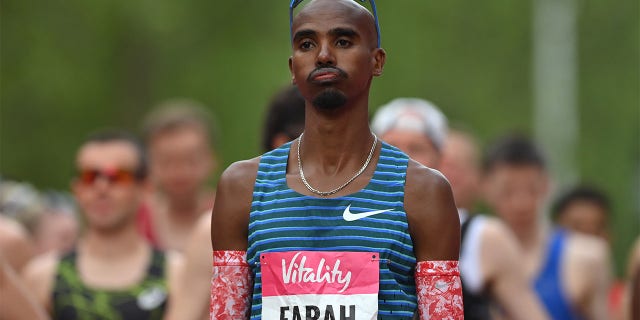 Mo Farah reacts to the start of the men's elite race during the Vitality London 10,000m road race on May 2, 2022 in London, England.