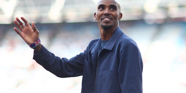 Sir Mo Farah of the England team waves to fans before the Soccer Aid for Unicef 2022 match between England and the World XI at the London Stadium on June 12, 2022 in London, England.