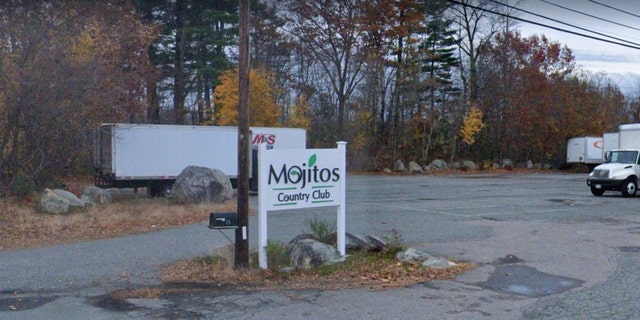 A sign for Mojitos Country Club in Randolph, Massachusetts
