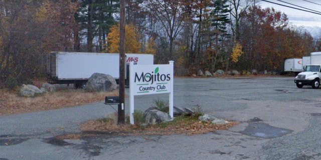 A sign for Mojitos Country Club in Randolph, Massachusetts