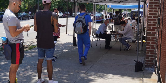 NEW YORK CITY, US - JULY 14: People wait in line for monkey pox vaccination after Monkey pox appointment website in New York City crashed on due to overwhelming traffic, local sources said on Thursday, July 14. Local authorities announced that the number of cases is increasing across the country, including in New York City.