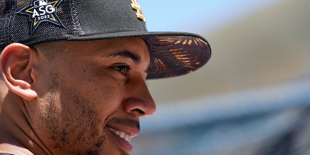 National League outfielder Mookie Betts, of the Los Angeles Dodgers, looks on during batting practice prior to the MLB All-Star baseball game, Tuesday, July 19, 2022, in Los Angeles. 