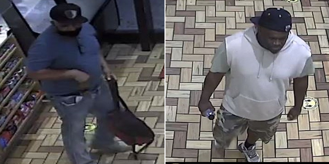 The two men being sought by the NYPD in connection to the robbery.