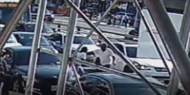 The 26-year-old pregnant victim is seen trying to flee from the suspect.