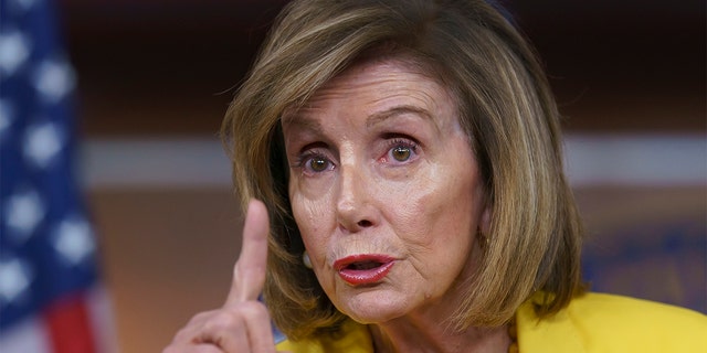 Nancy Pelosi, D-Calif., talks with reporters at the Capitol in Washington in 2022. 