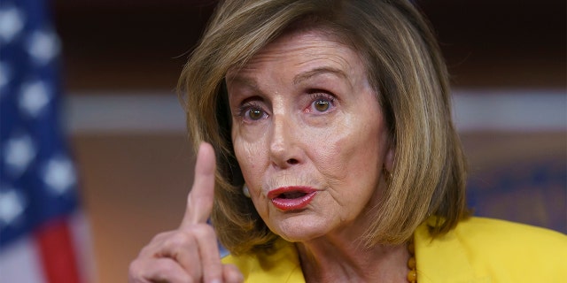 Nancy Pelosi, D-Calif., talks with reporters at the Capitol in Washington in 2022. 