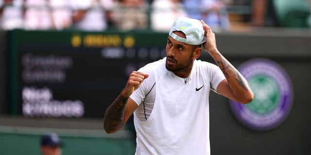 Nick Kyrgios of Australia celebrates winning a match against Cristian Garin of Chile during their men's singles quarterfinal match at Wimbledon 2022 at the All England Lawn Tennis and Croquet Club on July 6, 2022, in London. 