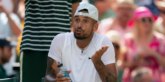 Jul 10, 2022: Nick Kyrgios (AUS) reacts to his box during the men’s final against Novak Djokovic (not pictured) on day 14 at All England Lawn Tennis and Croquet Club.