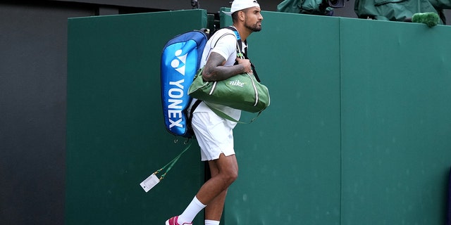 Nick Kyrgios of Australia stepped onto the court with a red trainer on the eighth day of the 2022 Wimbledon Championship at the All England Lawn Tennis and Croquette Club in Wimbledon. Shooting date: Monday, July 4, 2022.
