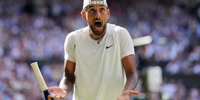 Australia's Nick Kyrgios reacts as he plays Serbia's Novak Djokovic in the final of the men’s singles on day fourteen of the Wimbledon tennis championships in London, Sunday, July 10, 2022.
