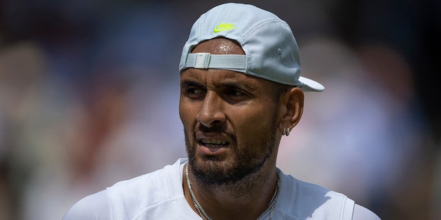 Nick Kyrgios, of Australia, during his match against Brandon Nakashima, of  the United States of America, during their Men's Singles Fourth Round match on day eight of The Championships Wimbledon 2022 at All England Lawn Tennis and Croquet Club on July 04, 2022 in London, England.
