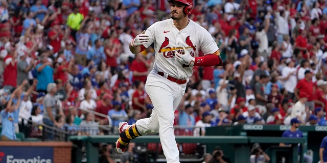 The St. Louis Cardinals' Nolan Arenado celebrates after hitting a two-run home run during the third inning against the Los Angeles Dodgers July 13, 2022, in St. Louis.