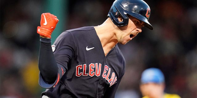 Cleveland Guardians' Nolan Jones pumps his fist while celebrating on his three-run home run off Boston Red Sox starting pitcher Josh Winckowski during the third inning during a baseball game at Fenway Park, Tuesday, July 26, 2022, in Boston.