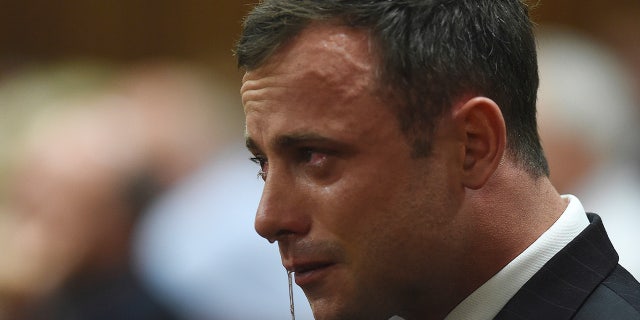 Oscar Pistorius weeping after Judge Thokozile Mapisa cleared him of murder charges in the North Gauteng High Court in Pretoria Sept. 11, 2014.