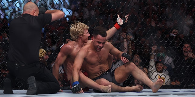 Paddy Pimblett of England celebrates defeating Jordan Leavitt of the U.S. in a lightweight bout during UFC Fight Night at O2 Arena July 23, 2022, in London.