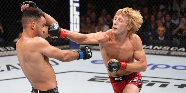 Paddy Pimblett of England punches Jordan Leavitt in a lightweight fight during UFC Fight Night at O2 Arena July 23, 2022, in London.