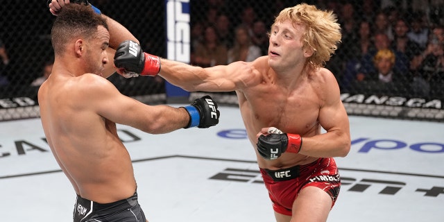 Paddy Pimblett of England punches Jordan Leavitt in a lightweight fight during UFC Fight Night at O2 Arena July 23, 2022, in London.
