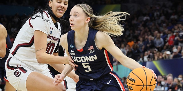 Paige Bueckers, #5 of the Connecticut Huskies, against the South Carolina Gamecocks in the championship game of the 2022 NCAA Women's Basketball Tournament at Target Center on April 03, 2022 in Minneapolis, Minnesota.