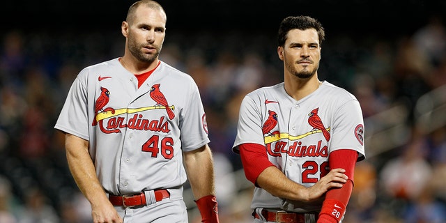 Paul Goldschmidt (46) and Nolan Arenado (28) of the St. Louis Cardinals after the first inning against the New York Mets at Citi Field Sept. 14, 2021, in New York City.
