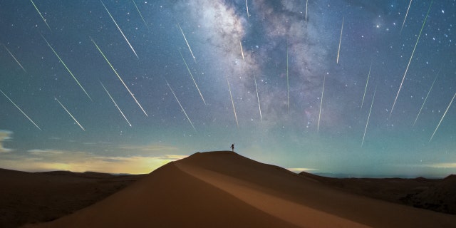 INNER MONGOLIA, CHINA -- AUGUST 17, 2021 -- The Perseid meteor shower is seen over the Tengger Desert in north China's Inner Mongolia Autonomous Region, August 17, 2020.