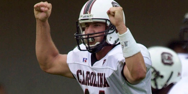 FILE - South Carolina quarterback Phil Petty celebrates after the Gamecocks scored against Vanderbilt on Saturday, Oct. 21, 2000, in Nashville, Tennessee.