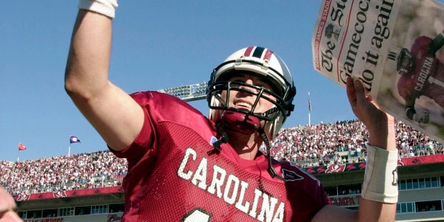 FILE - South Carolina quarterback Phil Petty celebrates after defeating Ohio State at the Outback Bowl on January 1, 2002 in Tampa, Florida.