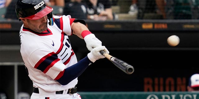 Chicago White Sox's AJ Pollock hits a three-run home run during the second inning of a baseball game against the Cleveland Guardians in Chicago, Sunday, July 24, 2022.