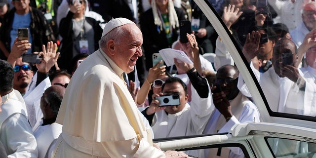 Pope Francis arrives to take part in a public mass at Commonwealth Stadium in Edmonton, July 26, 2022. 