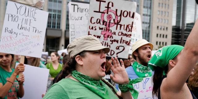 Women’s March activists attend a protest in the wake of the U.S. Supreme Court's decision to overturn the landmark Roe v. Wade abortion decision, in Washington, D.C., U.S., July 9, 2022.