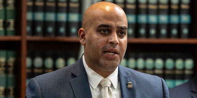 Acting Special Agent in Charge, Homeland Security Investigations Ricky Patel speaks during press conference at US Attorney Office library on May 5, 2022.