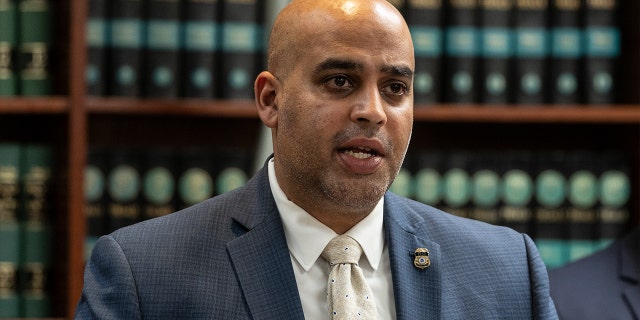 Acting Special Agent in Charge, Homeland Security Investigations Ricky Patel speaks during press conference at US Attorney Office library on May 5, 2022.