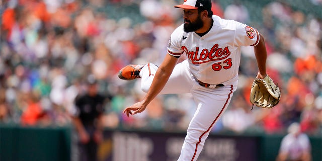 Baltimore Orioles starting pitcher Rico Garcia throws a pitch to the Los Angeles Angels during the eighth inning of a baseball game, Sunday, July 10, 2022, in Baltimore. The Orioles won 9-5 to sweep the series.