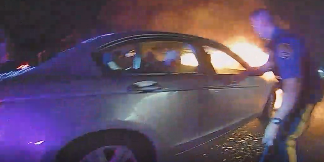 New Jersey police officers save man from burning car in dramatic video 2 The Ridgefield Park Police Department has released a dramatic video showing three of its officers rescuing a driver from a burning car on Saturday, July 2.