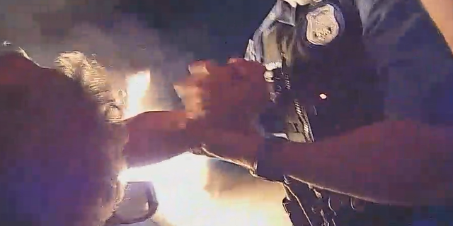 New Jersey police officers save man from burning car in dramatic video 4 The driver, who received medical treatment at the scene, eventually was able to leave with a family member, police say.
