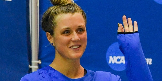 Kentucky swimmer Riley Gaines reacts after finishing tied for fifth in the 200 freestyle finals at the NCAA swimming and diving championships March 18, 2022, at the McAuley Aquatic Center in Atlanta.