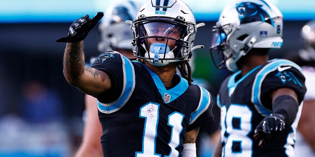 Robby Anderson, #11 of the Carolina Panthers, reacts following a catch during the second half of the game against the Tampa Bay Buccaneers at Bank of America Stadium on December 26, 2021 in Charlotte, North Carolina.