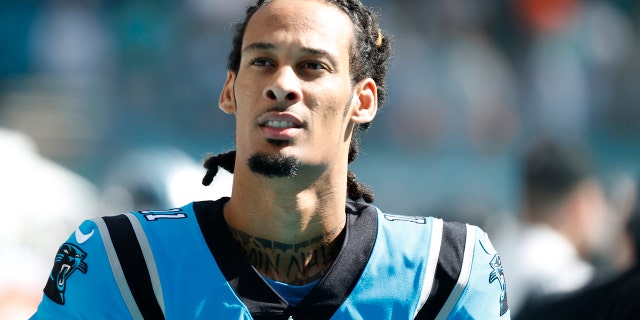 Robby Anderson, #11 of the Carolina Panthers, looks on before the game against the Miami Dolphins at Hard Rock Stadium on November 28, 2021 in Miami Gardens, Florida.