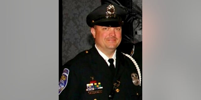 Rochester police Officer Anthony Mazurkiewicz was shot and killed Thursday night. On Friday, authorities said a Boston-area man had been arrested and charged with the killing. 