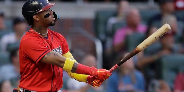 Ronald Acuña Jr. of the Braves watches his three-run homer off Washington Nationals' Erick Fedde on Friday, July 8, 2022, in Atlanta.