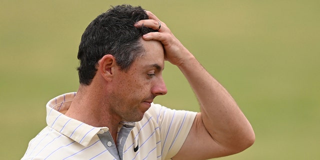 Rory McIlroy of Northern Ireland looks dejected on the 18th green during The 150th Open at St. Andrews Old Course on July 17, 2022, in St. Andrews, Scotland.