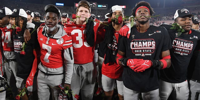 Ohio State Buckeyes players celebrate on the field after the Buckeyes defeated the Utah Utes 48 to 45 to win the Rose Bowl game played on January 1, 2022 at the Rose Bowl in Pasadena CA.