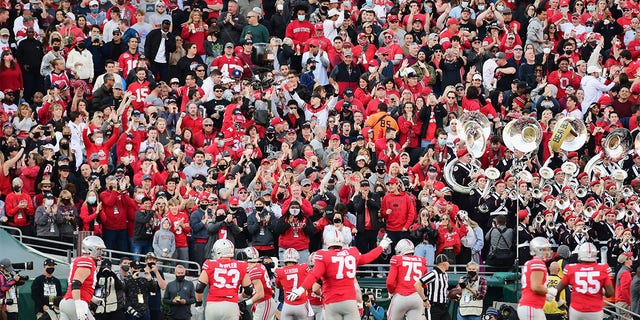 Fans in the Ohio State Buckeyes section of the Rose Bowl react to a Buckeye touchdown scored in front of them during the first half of the Rose Bowl game against the Utah Utes played on January 1, 2022 at the Rose Bowl in Pasadena CA. 