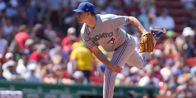 Toronto Blue Jays' Ross Stripling follows through on a pitch against the Boston Red Sox in the third inning of a baseball game, Sunday, July 24, 2022, in Boston. 