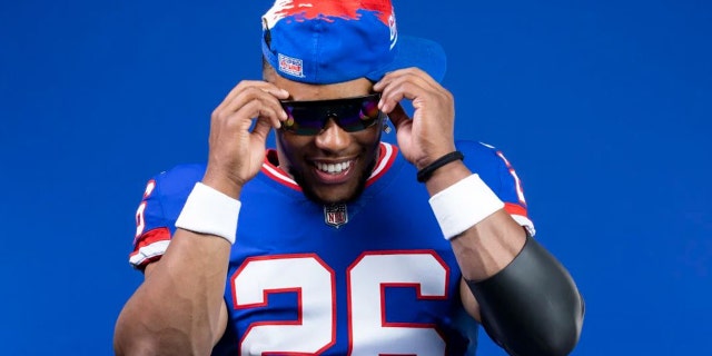 Saquon Barkley rocks the classic Giants gear. He was featured in the Giants' announcement video.