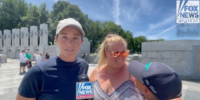 A family of three discusses why the loves the country while enjoying a day at the National Mall in Washington, D.C. (Fox News Digital/ Jon Michael Raasch)